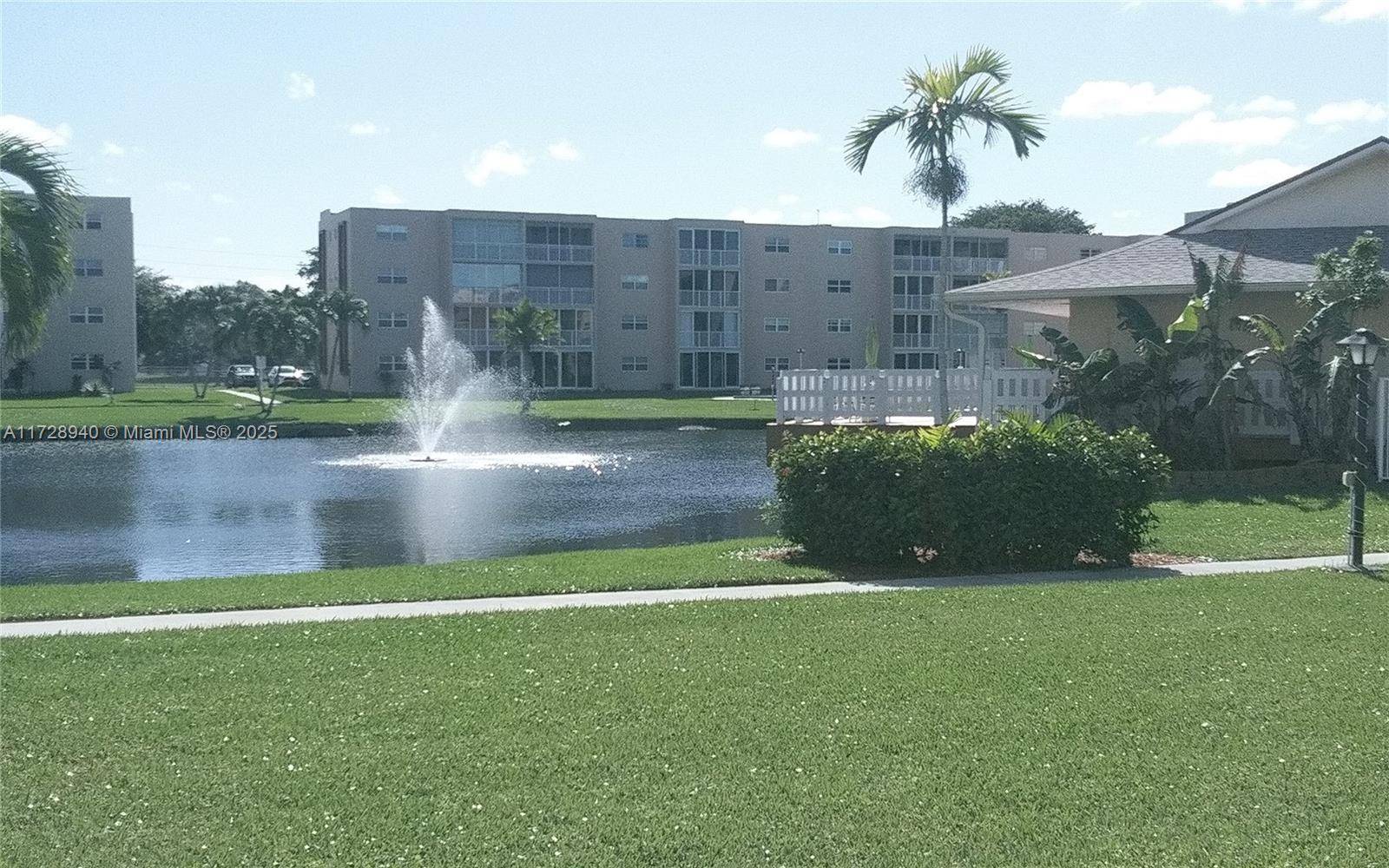 1st Floor Corner Unit ! Spacious 2 2 w Enclosed Patio Overlooking A Beautiful Lake Fountain View !