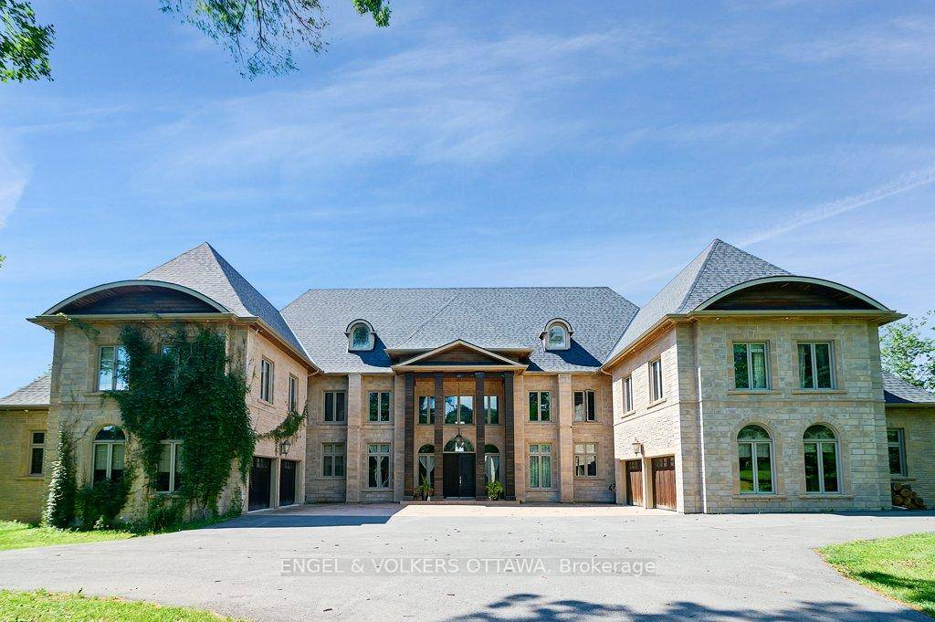 Welcome to 2892 Presquile Road, an exquisite estate sitting on 20 acres of waterfront, inspired by the Chateau de Champlatreux in France.