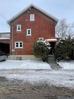 This charming two bedroom, one bathroom apartment spans two storey's, offering a cozy and functional layout.