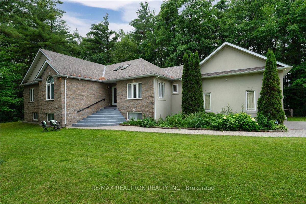 Welcome To This Beautiful Custom Built 3 Bedroom, 3 Bathroom Bungalow Nestled On A Premium Corner Lot In The Charming Town Of Tiny !