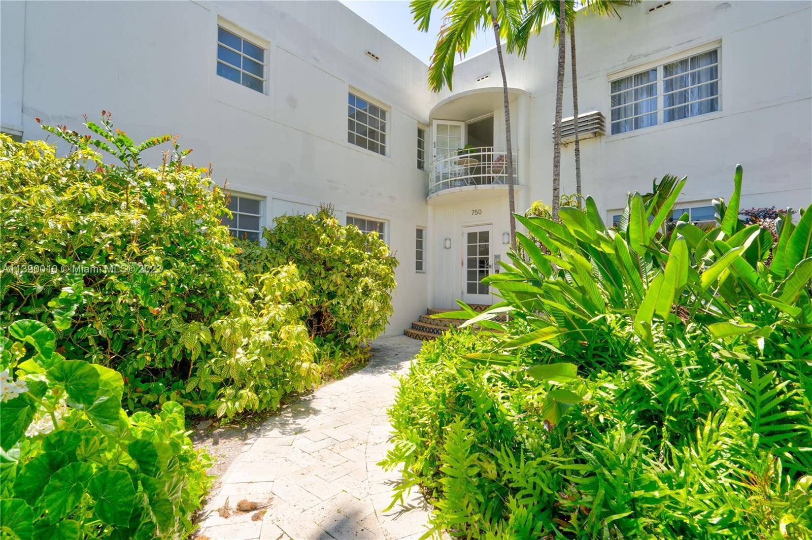 Renovated, Charming and spacious modern partly furnished studio Jr 1br with semi private balcony overlooking tropical courtyard at Española Court Condo in South Beach, an iconic Art Deco building designed ...