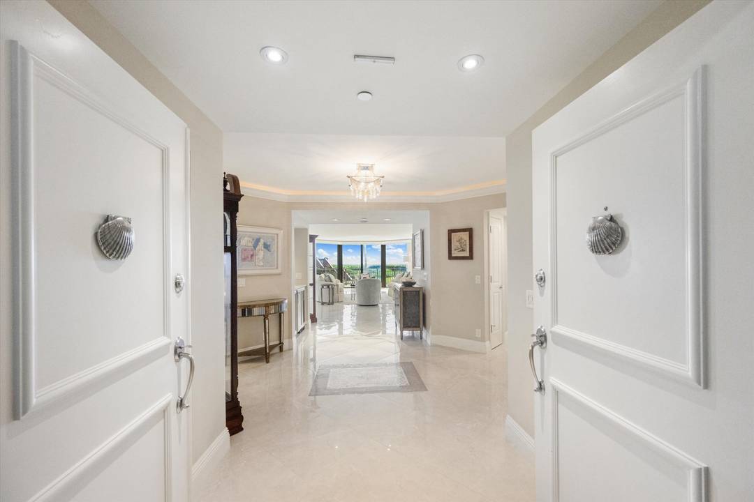 Experience unparalleled coastal luxury in this exceptional direct oceanfront residence on coveted Jupiter Island, showcasing panoramic ocean and Intracoastal views with a beautifully updated interior designed for effortless living.