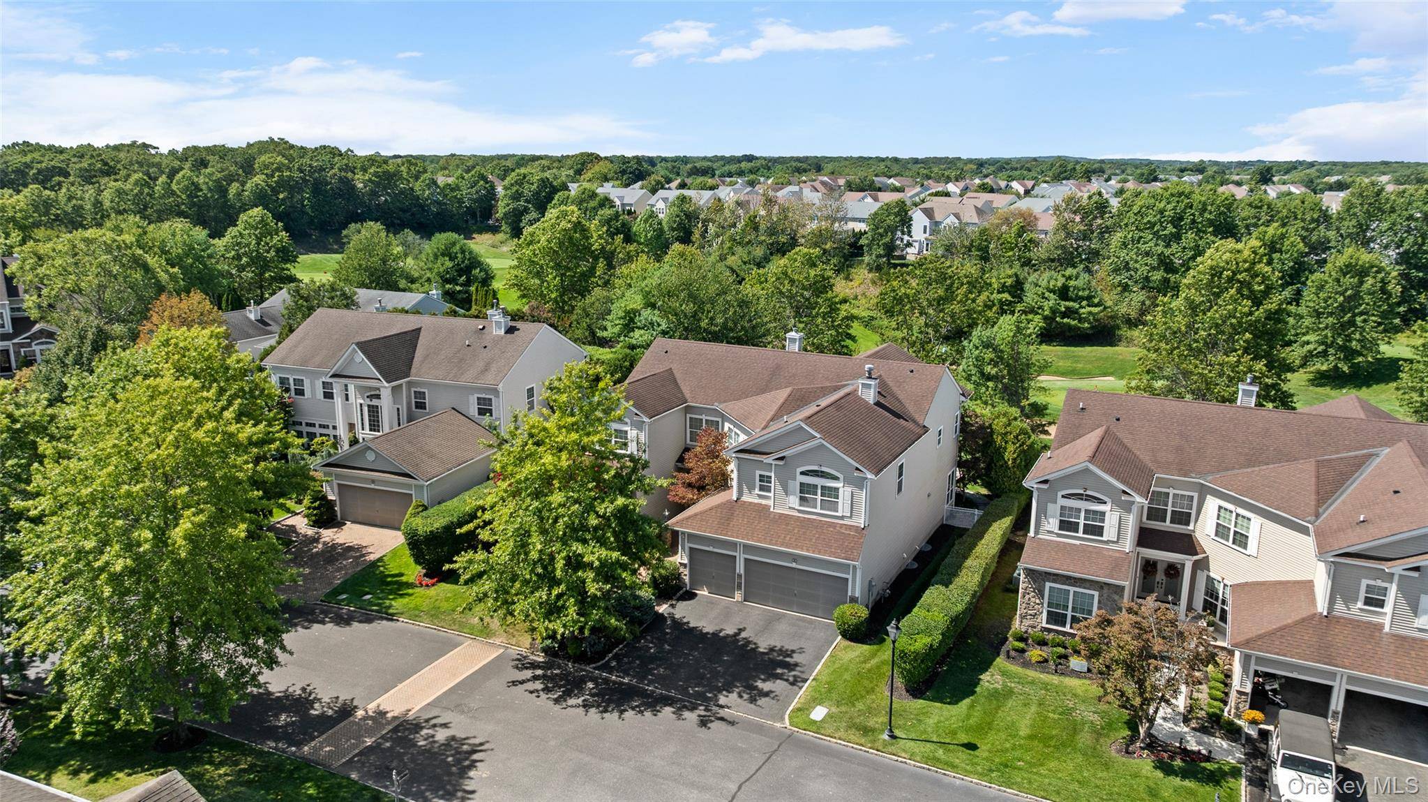 Welcome to this elegantly designed and modern glam Gleneagle Estate Home located in the highly desirable gated community of The Hamlet at Willow Creek in Mount Sinai.