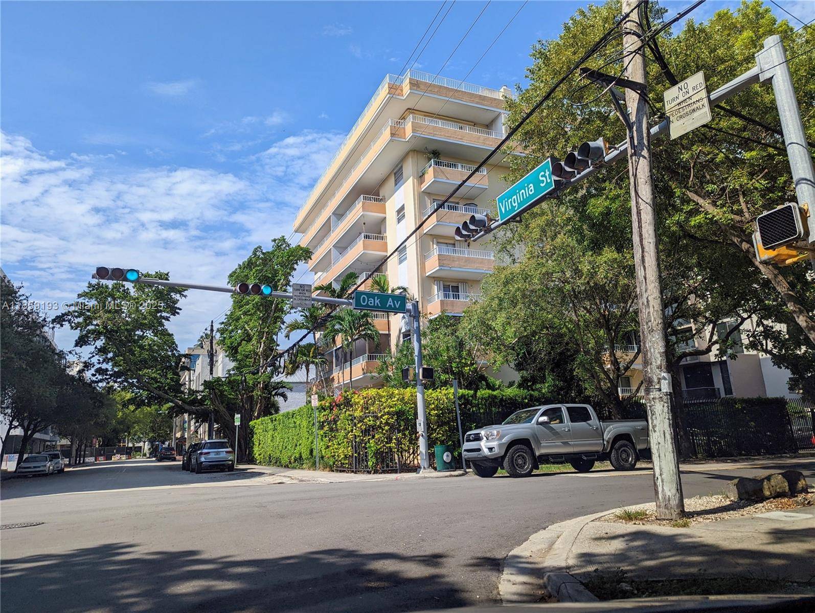 RARELY AVAILABLE. BRIGHT AND SPACIOUS CORNER UNIT IN A COCONUT GROVE BOUTIQUE BUILDING, STEPS FROM COCOWALK, AND ALL THE SHOPS AND RESTAURANTS THE CITY HAS TO OFFER.