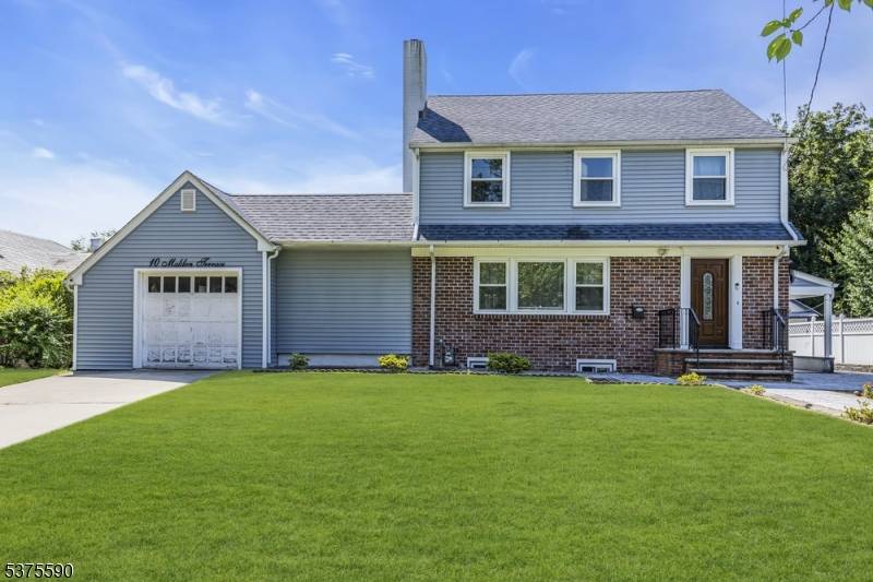 Welcome to this charming colonial home that blends timeless character with abundant space and modern versatility.