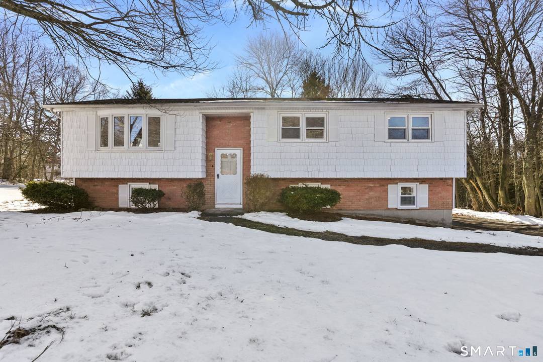 Welcome to 1 Winfield Avenue, perfectly situated in one of Wolcott's most desirable suburban neighborhoods, offering a peaceful setting removed from city congestion while remaining close to everyday conveniences.