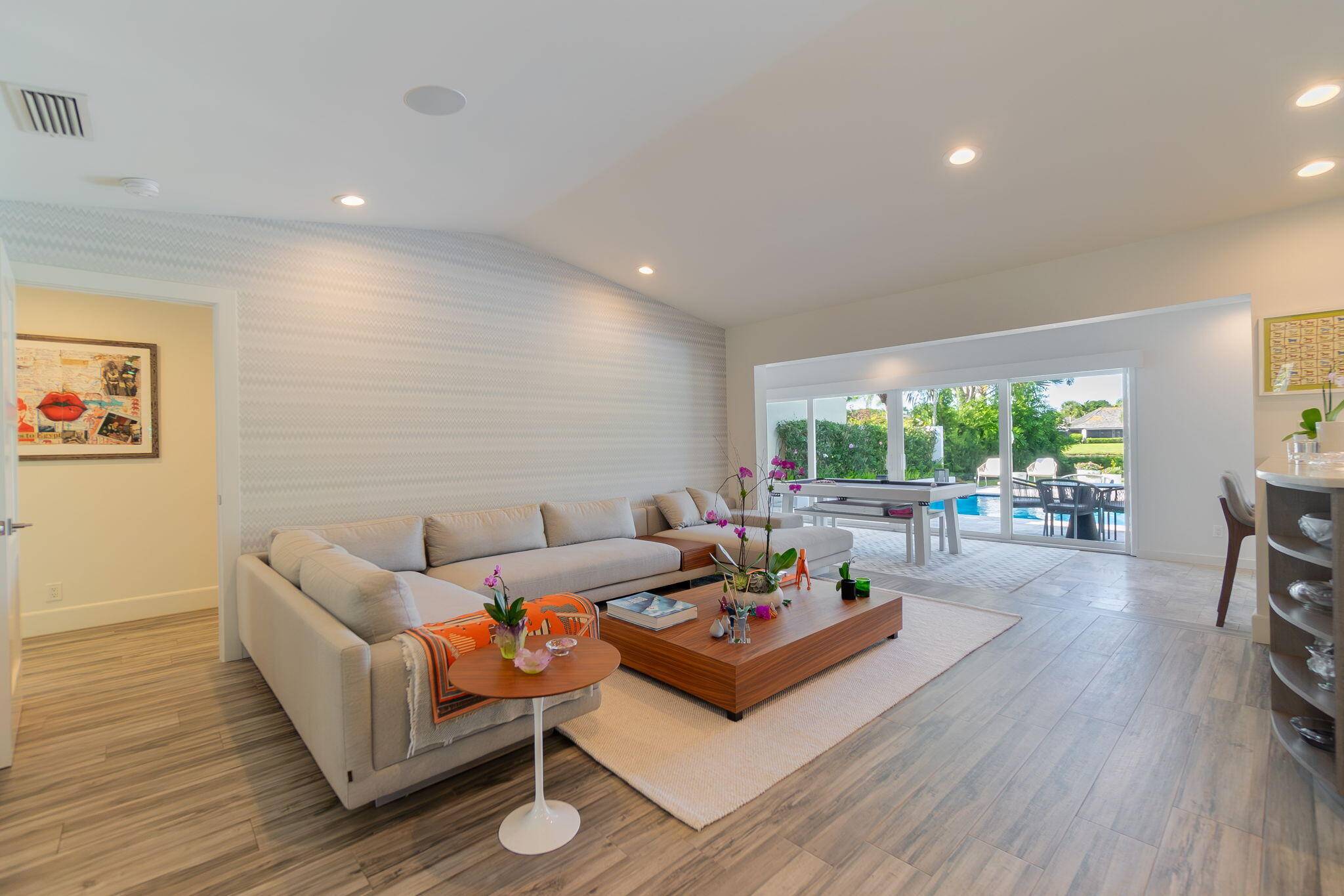 Welcome to 2291 Las Casitas Dr, a beautifully renovated 2 bedroom, 2 bathroom villa in the exclusive Palm Beach Polo Country Club.