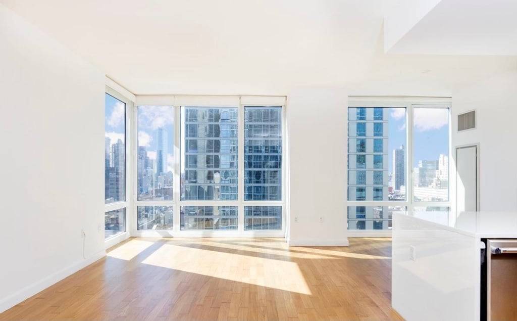 Mint condition one bedroom, one and a half bath residence featuring soaring 10 foot ceilings, floor to ceiling windows, and expansive open city views.