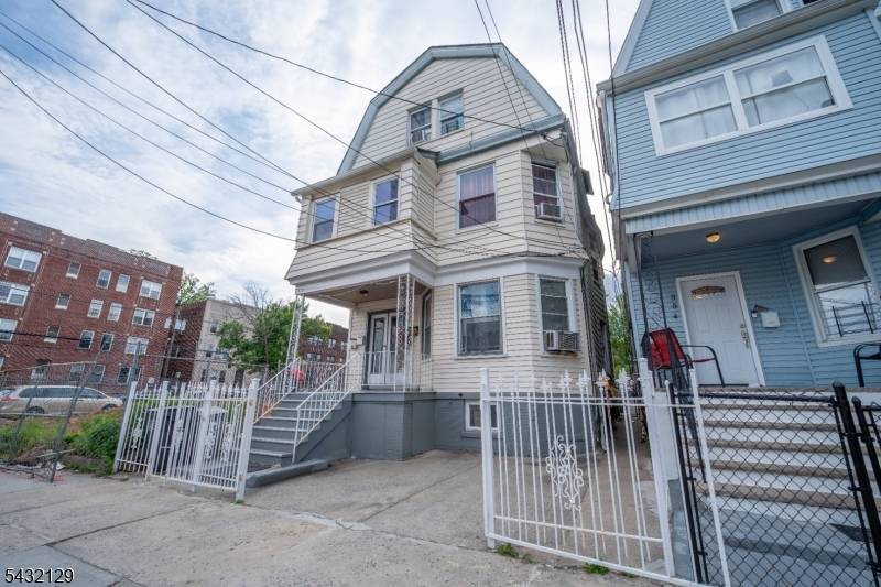 Well maintained three family property in Newark offering a total of 7 bedrooms and 3 full bathrooms.
