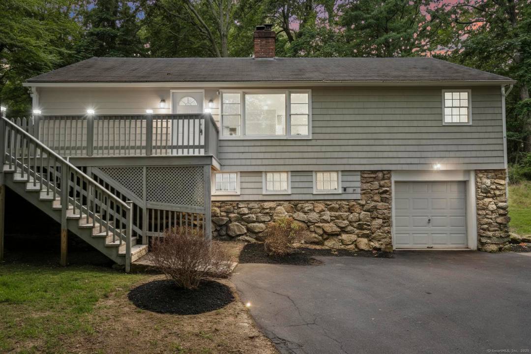 Tucked away in Guilford's sought after Westwoods neighborhood, this fully renovated 3 bedroom, 2 bath ranch combines modern updates with rare natural privacy.