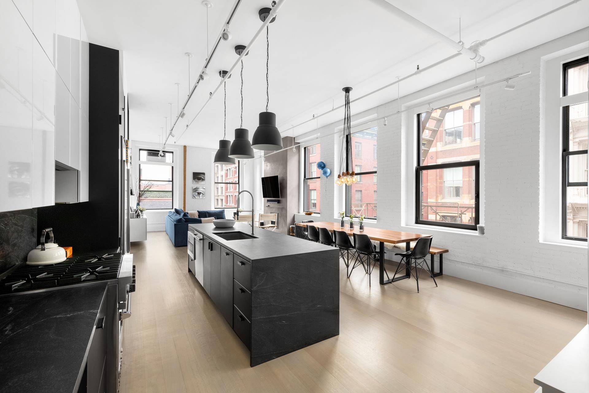 Rarely available mint condition corner loft in the heart of Soho.