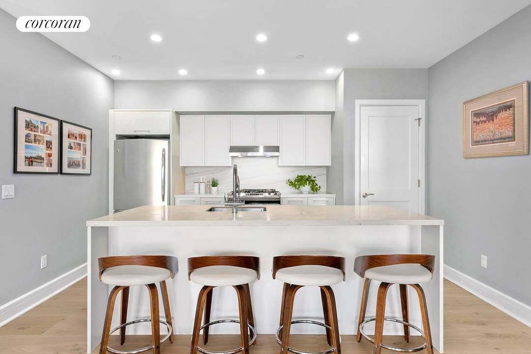 Enjoy the best of Harlem in this bright and spacious two bedroom, two bathroom home with magnificent views of historic brick townhouses and a tree lined boulevard.