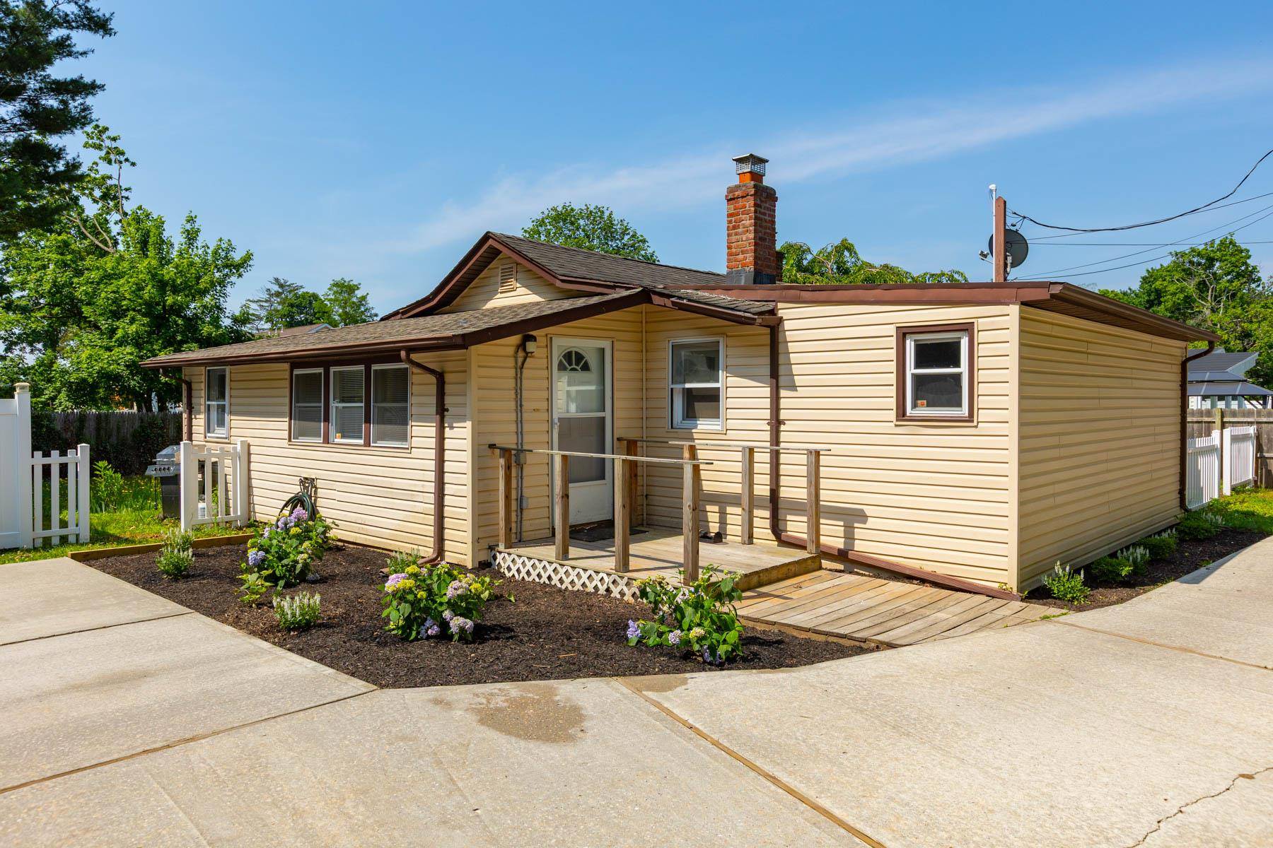 Charming and updated ranch set on a private flag lot.