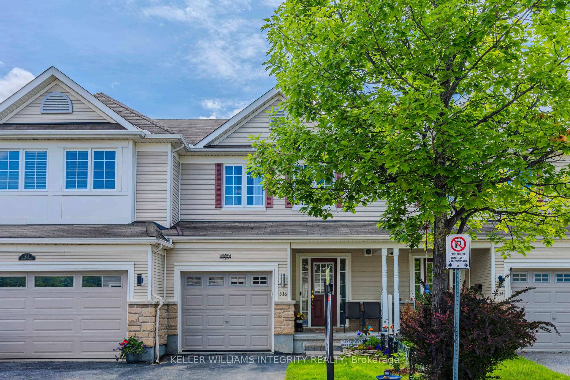 Stonebridge townhome on private street featuring 3 spacious bedrooms and 4 bathrooms.