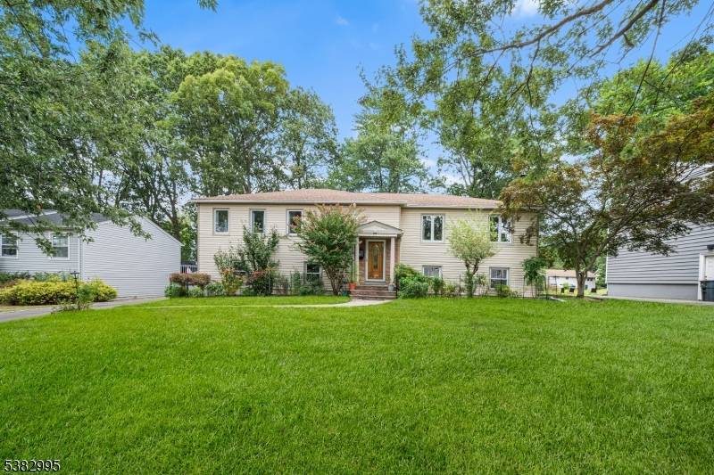 Welcome to this beautifully maintained 4 bedroom, 3 bath bi level home tucked away on a quiet, tree lined street in the heart of Livingston.