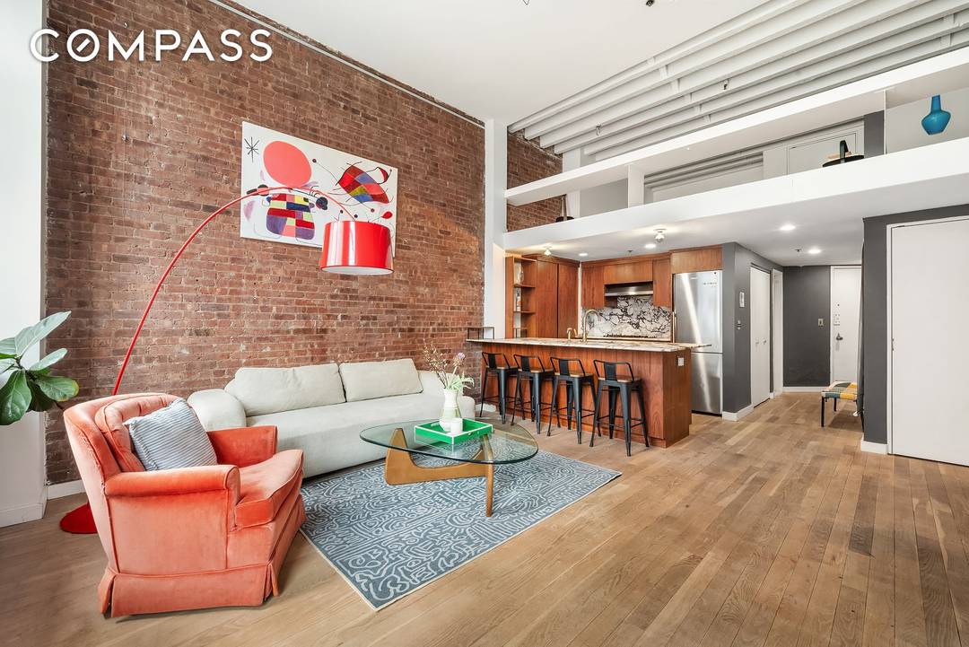 Located at 77 Bleecker Street, this spacious one bedroom duplex loft combines historic character with modern design in one of downtown Manhattan s premier full service buildings.