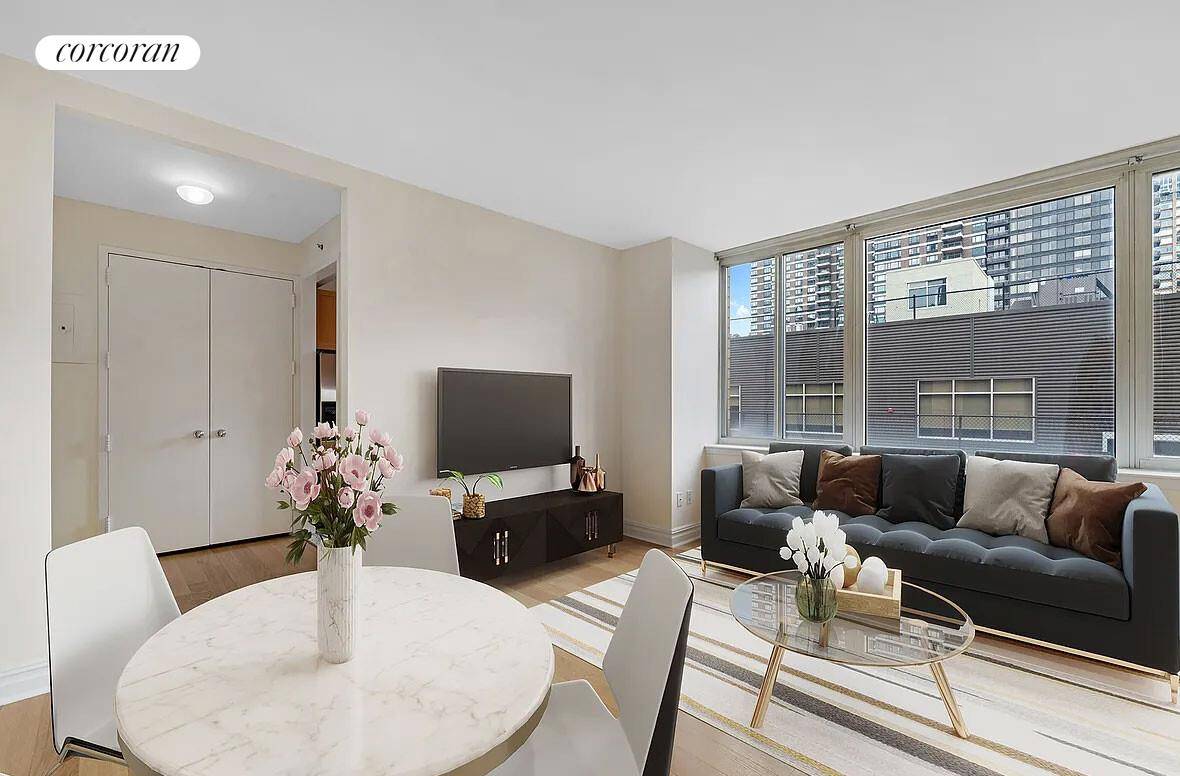 Bright Alcove studio apartment with Southern open views to the bridge in a full service luxury condominium.