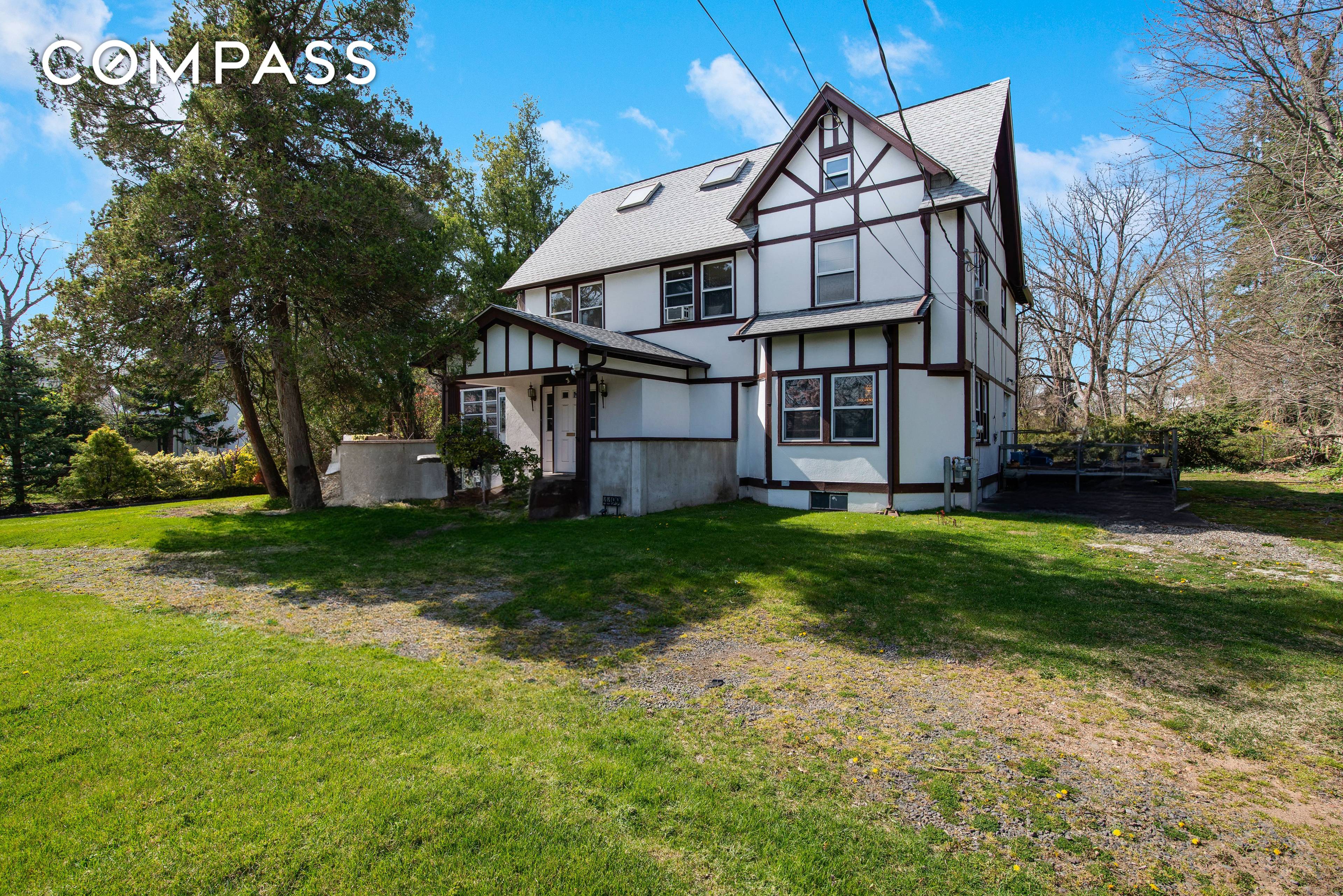 Welcome to this spacious Tudor home nestled in the Eltingville neighborhood of Staten Island.