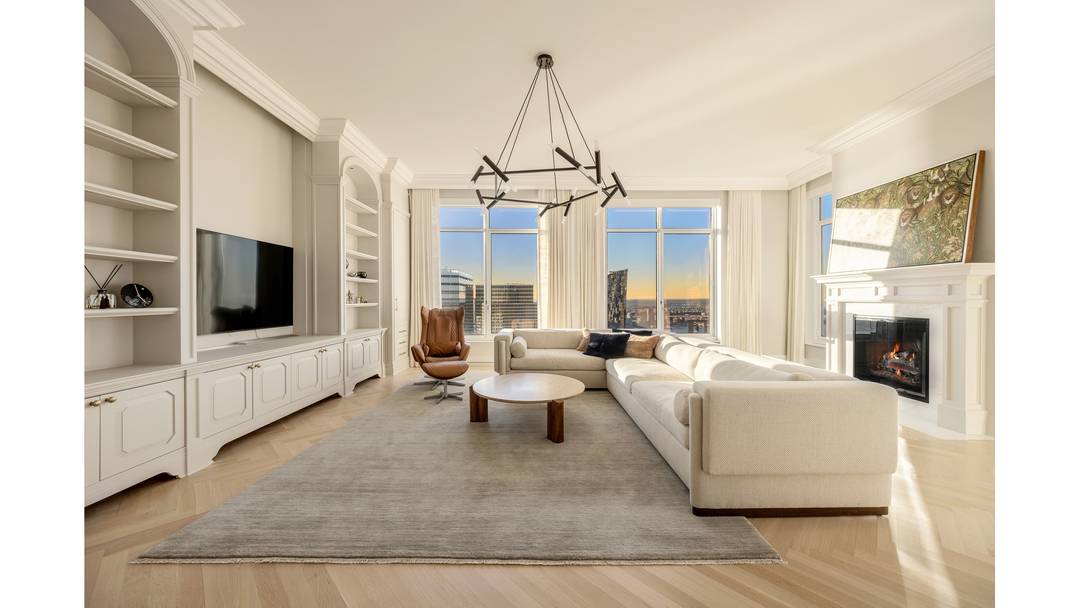 Perched high above Tribeca on the 67th floor of 30 Park Place, this exceptional four bedroom residence offers a rare combination of scale, elegance, and sweeping skyline and river views ...