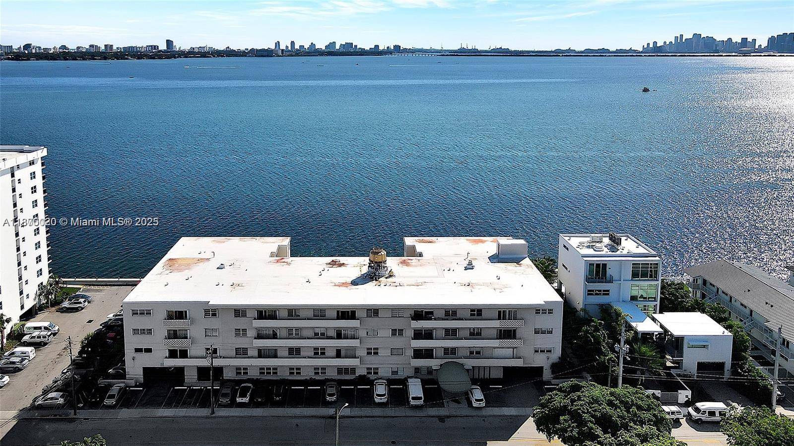 MILLION DOLLAR VIEWS FROM THIS SPACIOUS 2 2 CONDO IN HIGHLY SOUGHT AFTER NORTH BAY VILLAGE LOCATION.