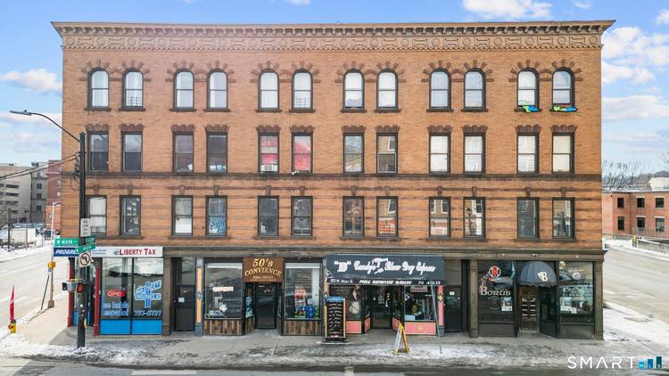 Exceptional mixed use investment opportunity Downtown featuring three contiguous parcels totaling 0.