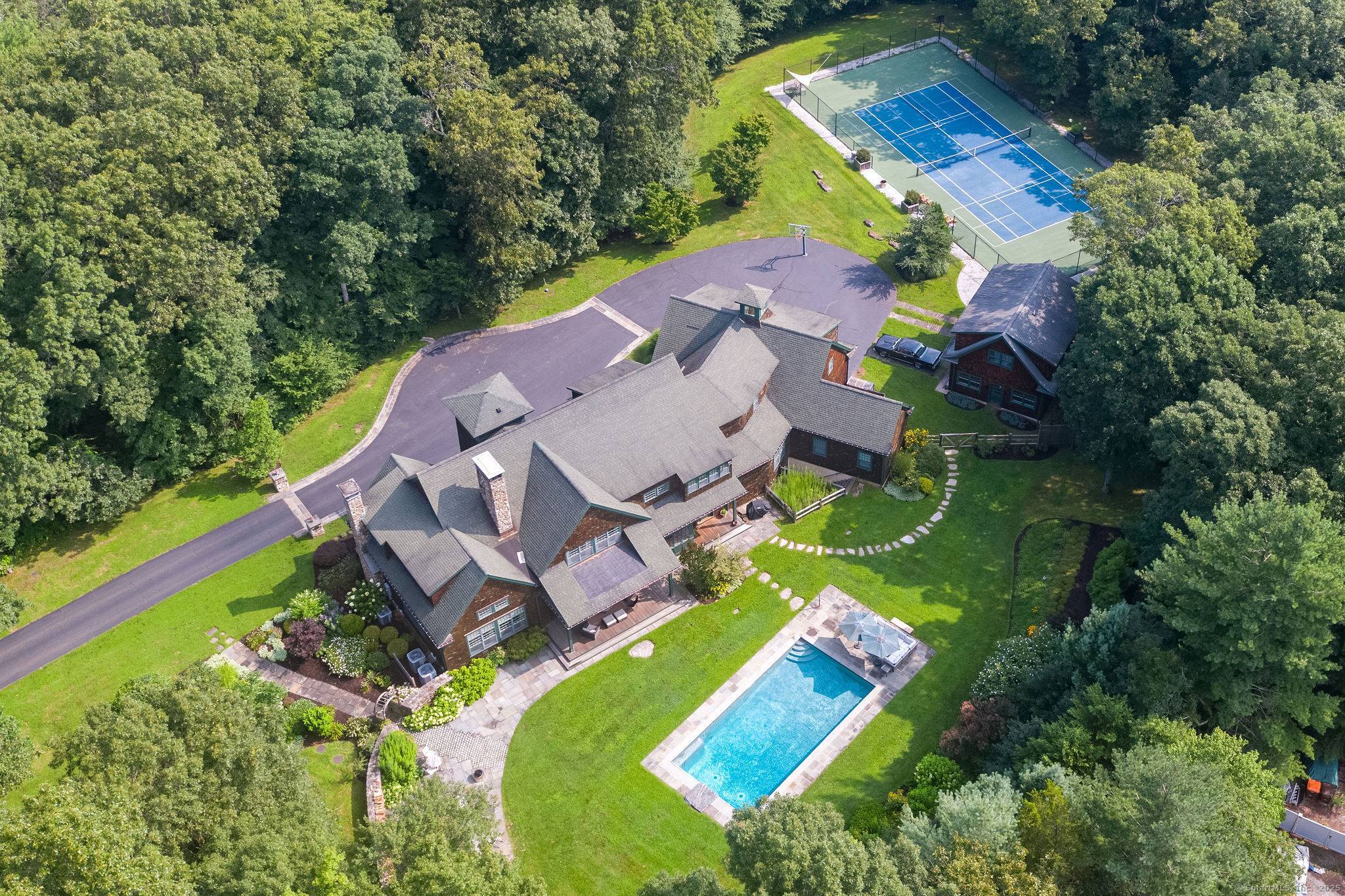 Introducing a custom built Adirondack style masterpiece, set on over 5 acres of pristine land.