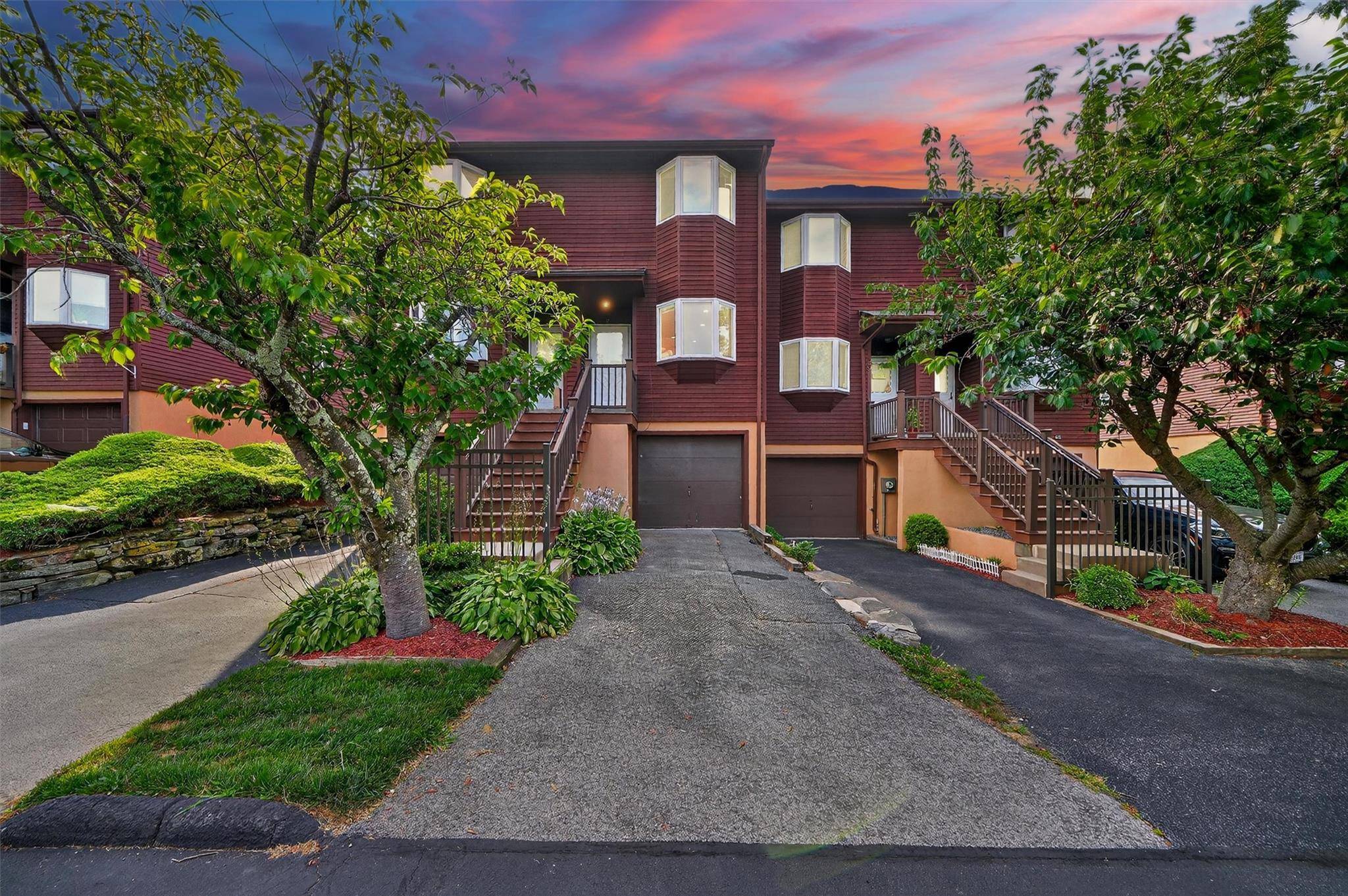 Welcome to 27 Knoll View a beautifully designed sun filled townhome offering exceptional value just minutes from the Hudson River.