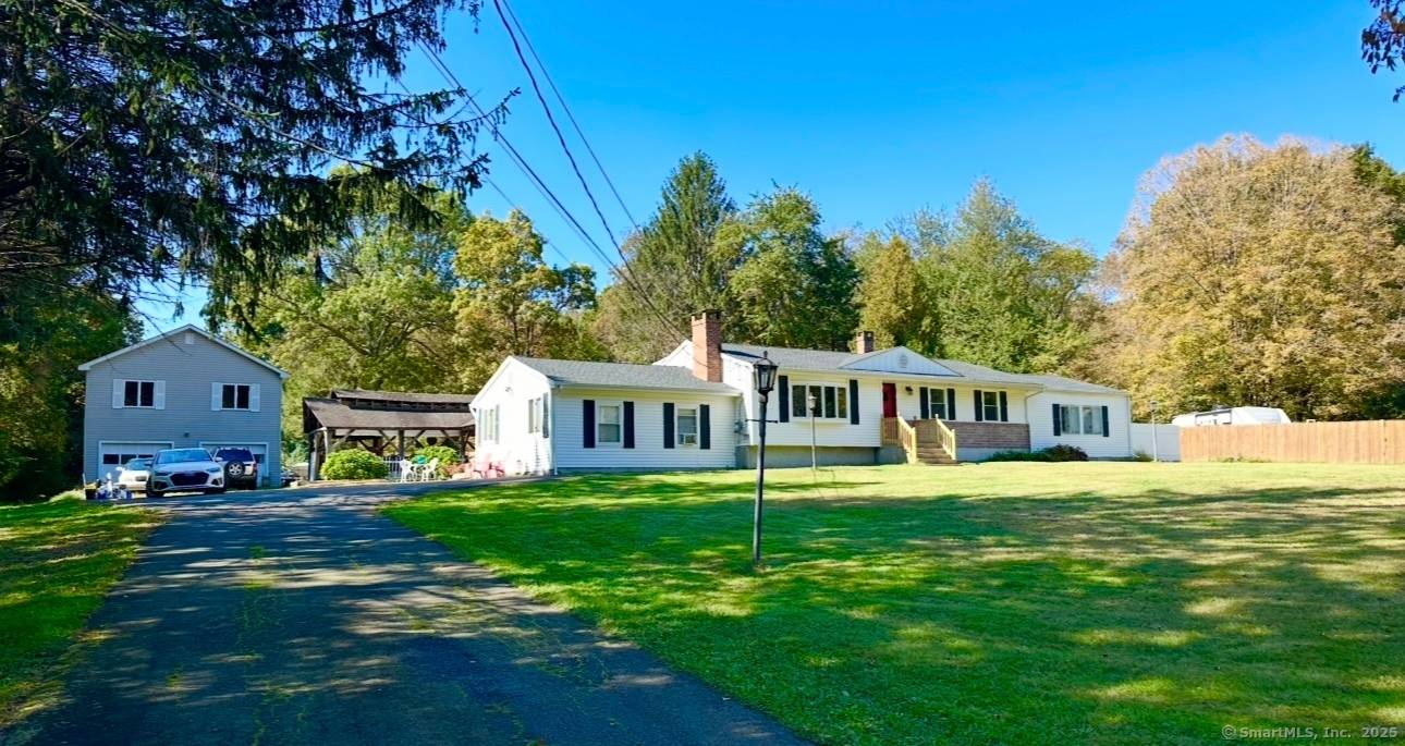 Welcome to your private sanctuary tucked away behind a stone wall on a lush 1.