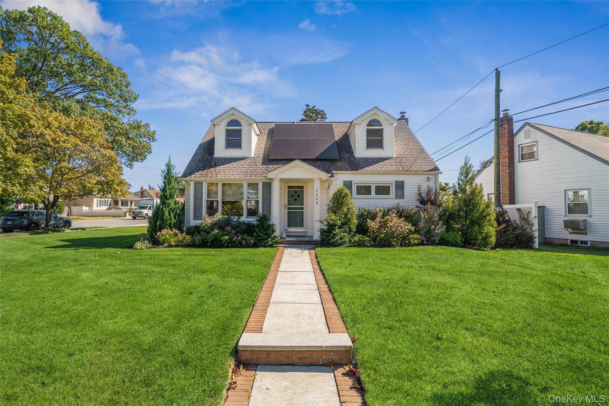 Home sweet home ! ! Beautifully kept cape style home on park like property.