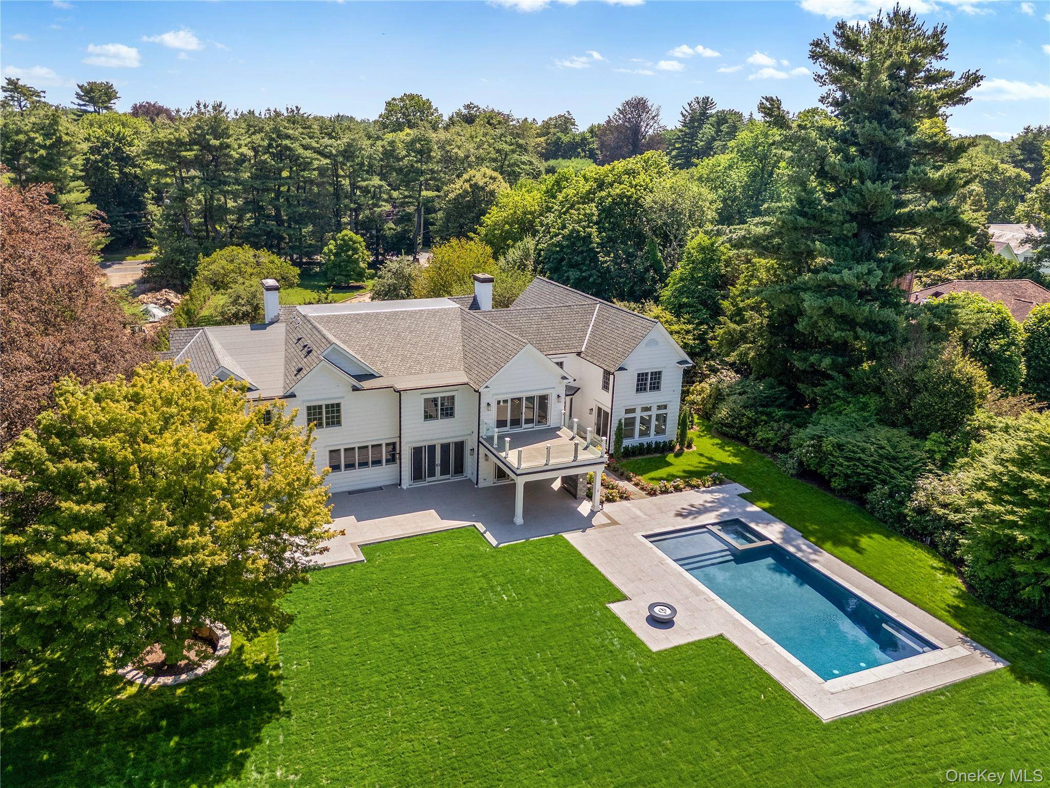Welcome to 42 Mamaroneck Road, a magnificent iconic estate ideally located in the heart of Scarsdale s prestigious Murray Hill neighborhood.