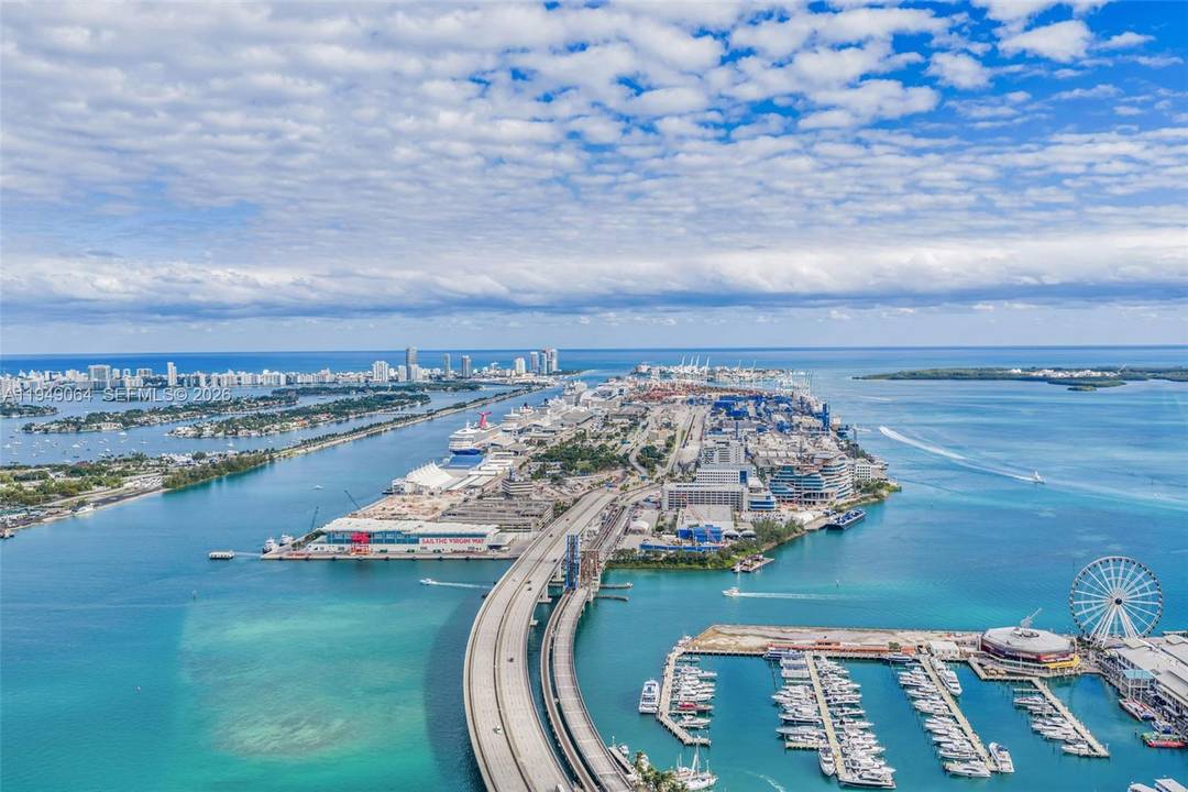 High floor, fully furnished studio at The Elser Hotel amp ; Residences showcasing panoramic skyline and Biscayne Bay views.
