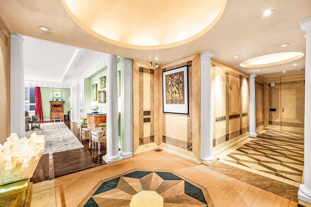 Rising above the Museum of Modern Art, Museum Tower remains one of Midtown s most distinctive luxury residences.