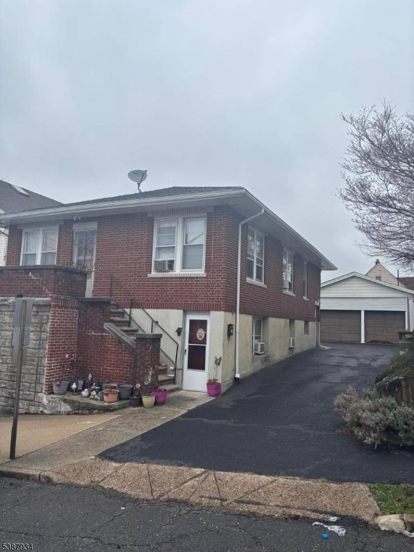 2 family home in the Great Falls section of Paterson.