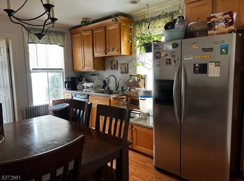 Welcome to this spacious 5 bedroom, 2 bath single family home situated on a generous lot in North Plainfield.