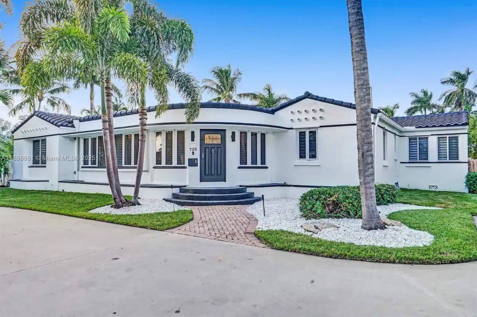 Embrace the best of coastal living in this bright and spacious 7 bedroom, 5 bath home, ideally located just a short walk from Hollywood Beach and the Intracoastal.