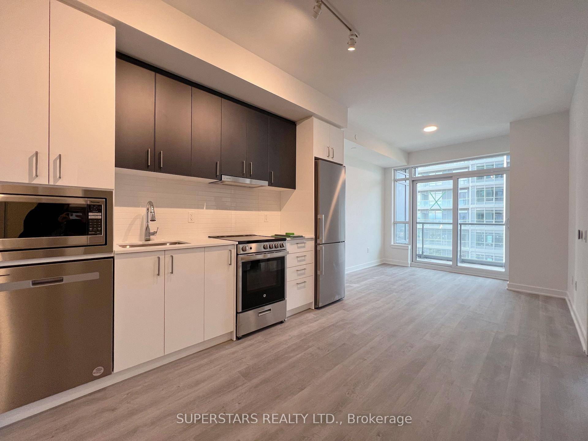 NEW Building ! Excellent 1 1Den Layout.