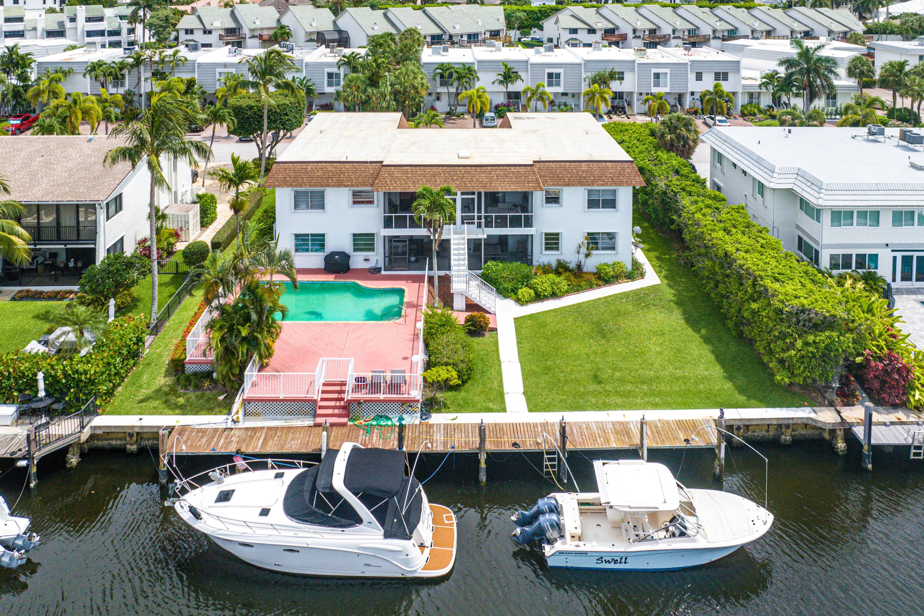 An Absolutely Fantastic Triplex located on 100 ft of Water frontage just off the Intracoastal and only Steps to the Beach.