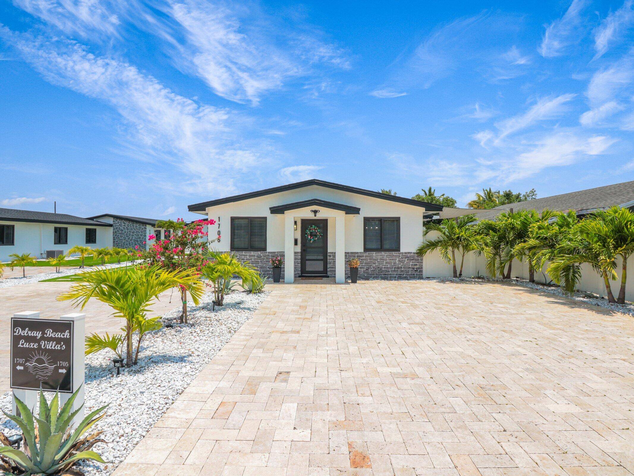 Do not miss this opportunity to own this 4 unit charming turn key high income producing vacation rental in the most beautiful beach town in south Florida.