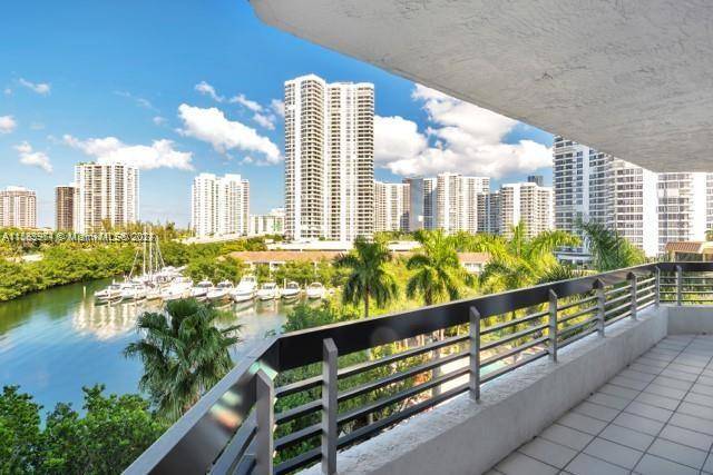 2 2 beautiful updated apartment in Mystic Pointe building 600 with a wraparound balcony and gorgeous views in the heart of Aventura.