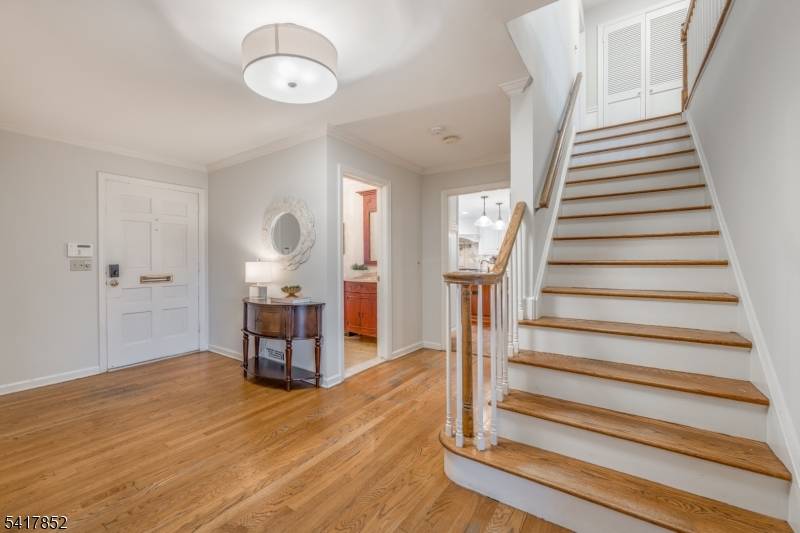TIMELESS 5 BEDROOM COLONIAL NESTLED IN ONE OF SUMMIT'S MOST COVETED NEIGHBORHOODS.
