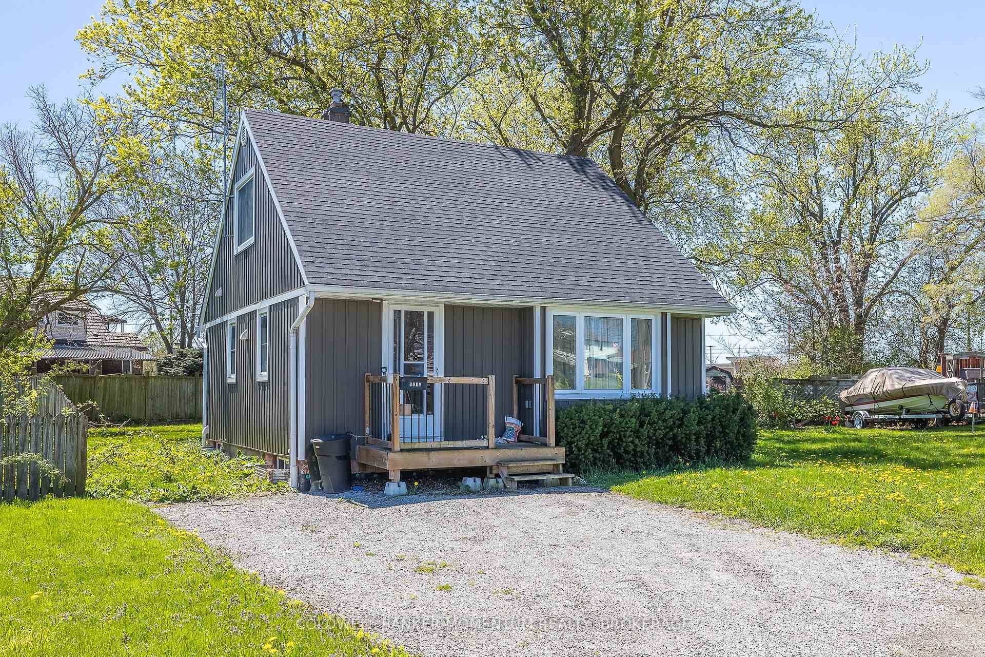Lovely 1. 5 storey home features open concept living with large living area, nice working kitchen main floor bedroom and full bath.