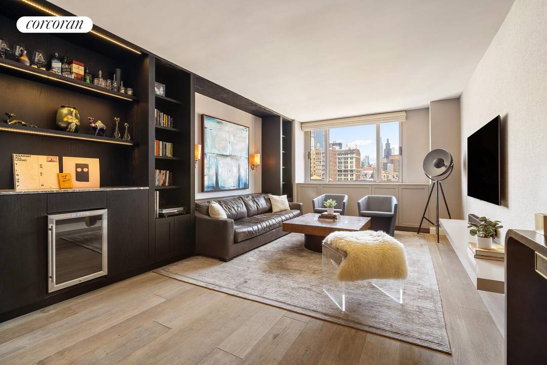 Designer Apartment Re Modeled by Black and Steel Studio, including Integrated Sonos surround sound throughout Spa inspired steam shower with digital controls Custom marble kitchen island with premium integrated appliances ...