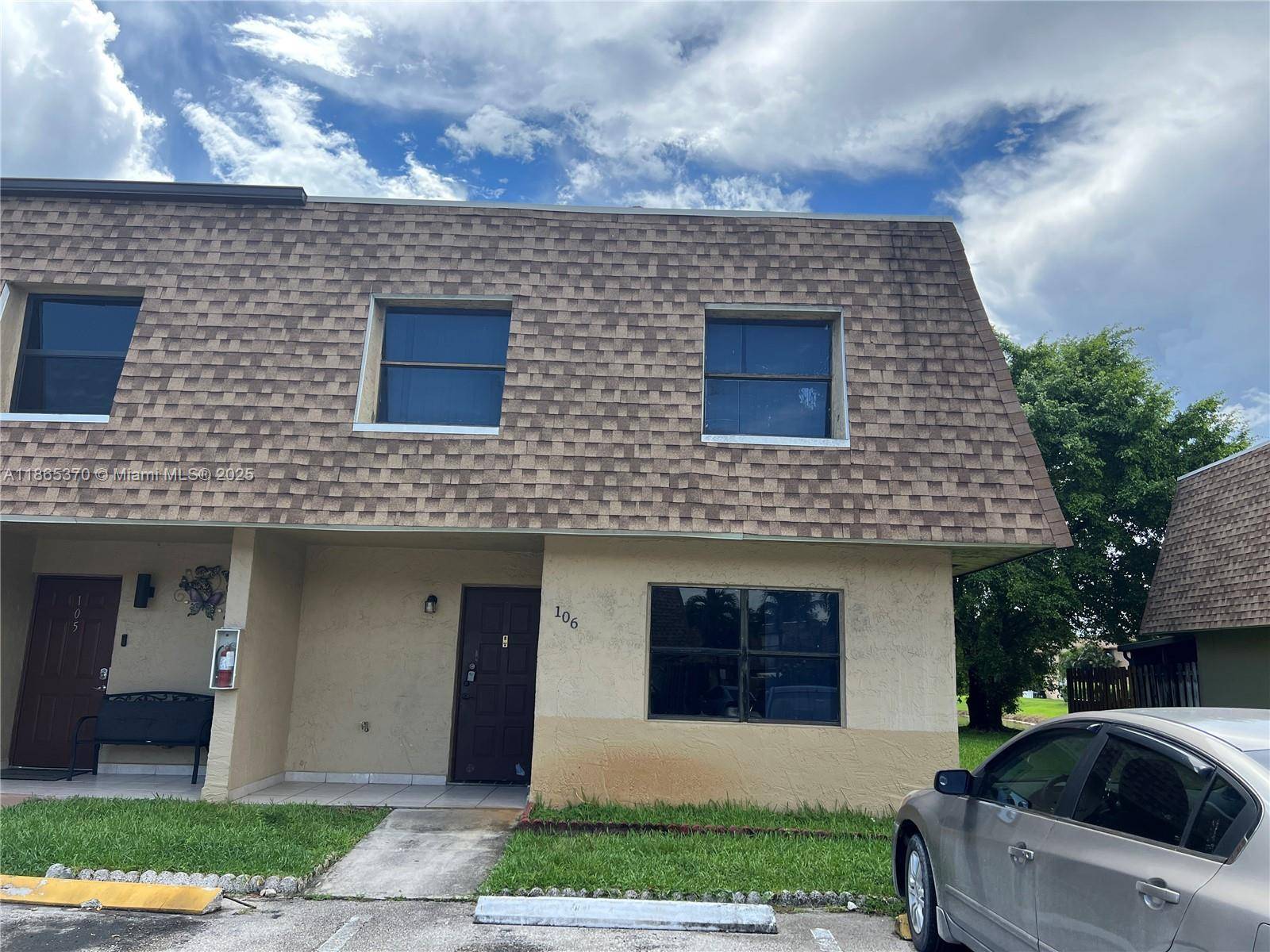 CENTRALLY LOCATED ALL TILE 3 BED 3 BATH CORNER TOWNHOUSE ON THE WATER.