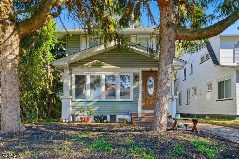 Welcome to 29 Enfield Ave where timeless charm meets modern updates in the heart of Montclair.