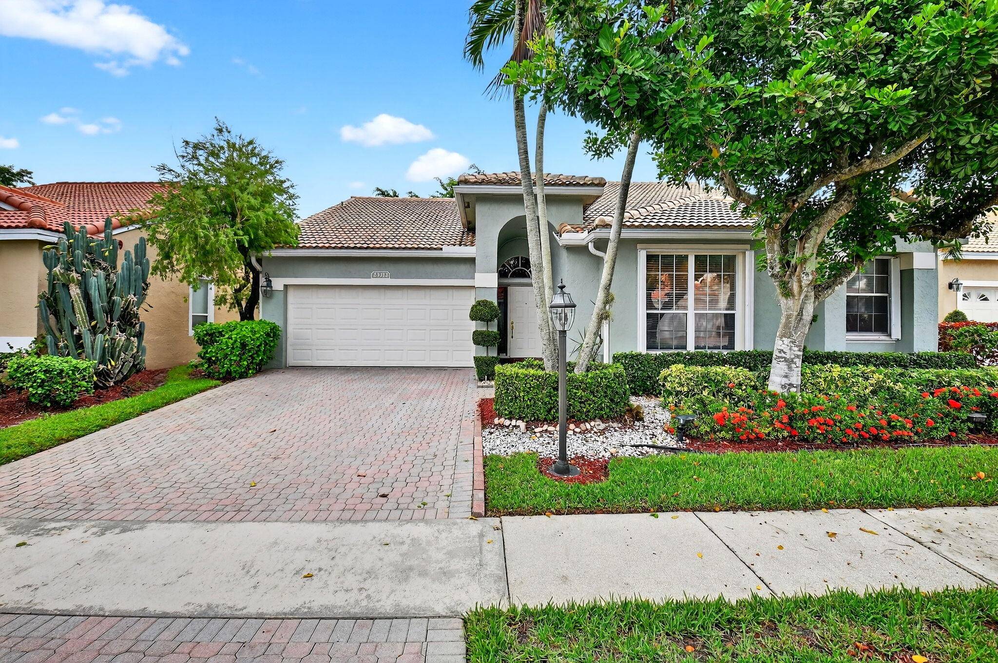 Custom one story home in Costa Del Sol at Boca Pointe featuring 4 bedrooms, 2.