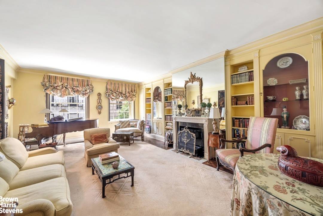 Welcome to this gracious and light filled one bedroom residence with a separate office on the same floor, nestled within one of the Upper East Side's most prestigious Rosario Candela ...