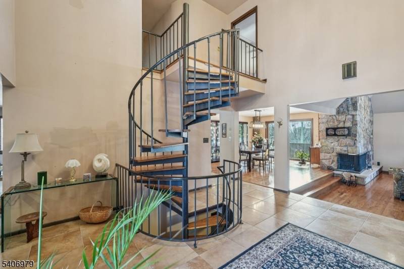 Custom Colonial on a very private cul de sac in one of the most desirable locations in Woodland Park.