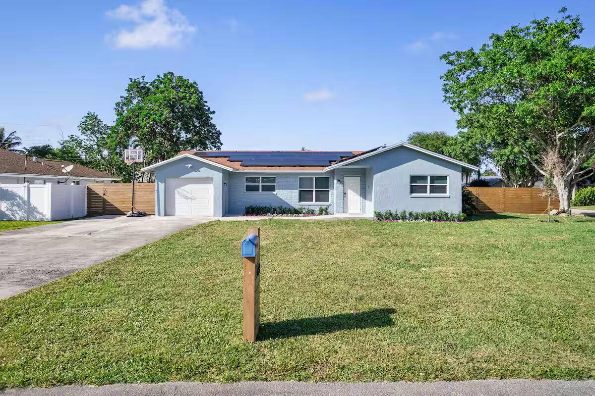 Stunning 4 Bed, 2 Bath Saltwater Pool Home w fenced yard in East Delray Beach Available furnished unfurnished for Short Long Term Rental.