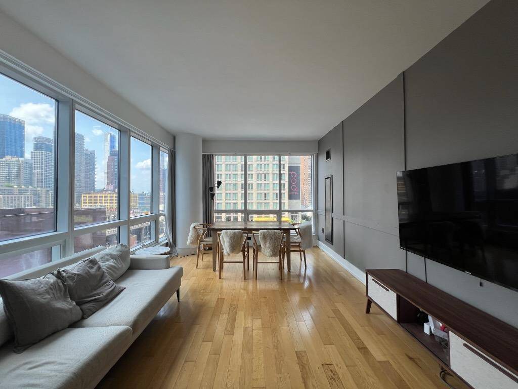 Located in prime Midtown Manhattan, this luxury condo spans 741 sq ft, featuring 1 bedroom and 1 bathroom with 9 foot floor to ceiling windows that flood the space with ...