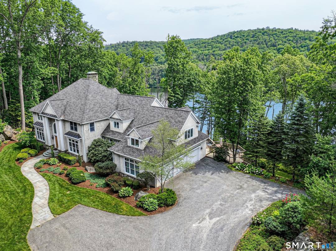 Set on 4. 3 private acres along the shores of Lake Lillinonah, this waterfront estate delivers a rare blend of privacy, scale, and direct lake access, complete with a private ...